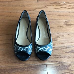 Black and white flats.